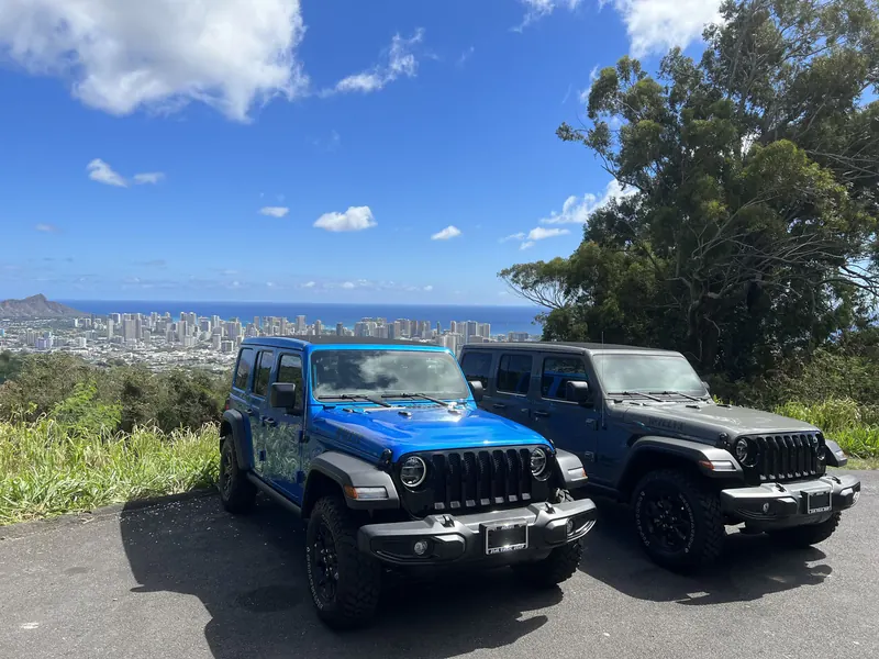 Blue Jeep overlooking Honolulu